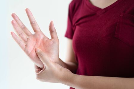 woman wrist arm pain long working. office syndrome healthcare and medicine conceptの写真素材