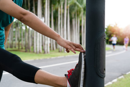 sport woman is stretching muscle before workout