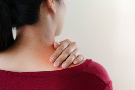 young women neck and shoulder pain injury, healthcare and medical conceptの写真素材