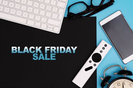 Black Friday Sale, electronic device on black and blue backgroundの写真素材