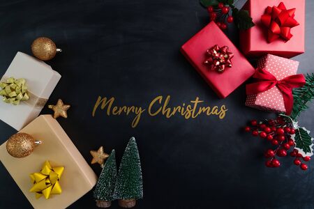 Merry Christmas, xmas present gift and decoration on black backgroundの写真素材
