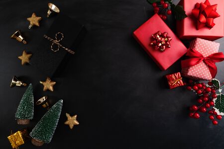 Merry Christmas, xmas present gift and decoration on black backgroundの写真素材