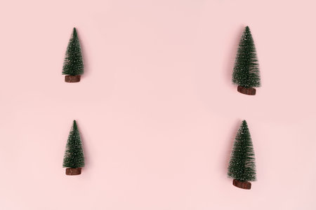 Christmas tree on pink background. Christmas, winter, new year concept. Flat lay, top view