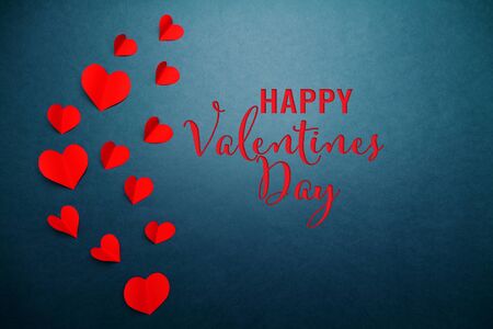 Valentine card with red heart on blue background, abstract, flat lay, top viewの写真素材