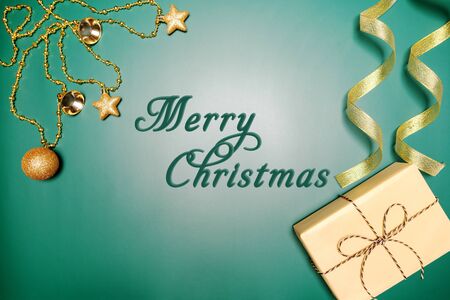 Christmas background concept. Top view of Christmas gift box and decoration on green backgroundの写真素材
