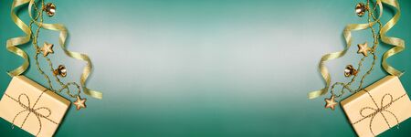 Christmas background concept. Top view of Christmas gift box and decoration on green backgroundの写真素材
