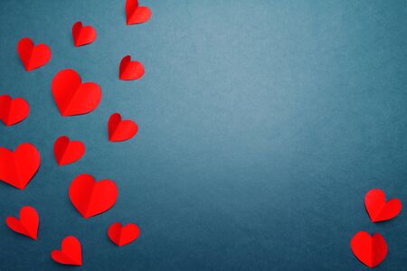 Valentine card with red heart on blue background, abstract, flat lay, top viewの写真素材