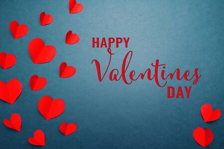 Valentine card with red heart on blue background, abstract, flat lay, top viewの写真素材
