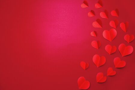 Valentine card with red heart on red background, abstract, flat lay, top viewの写真素材