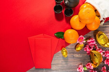 Chinese New Year offering red envelope chinese tea pot and orange , Translation of text appear in image: Prosperity, rich and healthyの写真素材