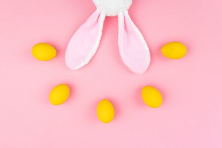 Easter day little Bunny rabbit ear With Decorated Eggsの写真素材
