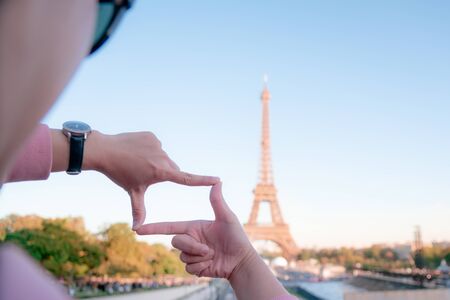 woman tourist in Eiffel tower, Paris landmark, sightseeing in Franceの写真素材