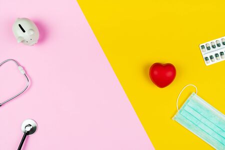 World health day concept Healthcare medical insurance with red heart, stethoscope, mask and medicineの写真素材
