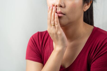 Beautiful woman with suffering from toothache, tooth decay or sensitivity. Women healthcare conceptの写真素材