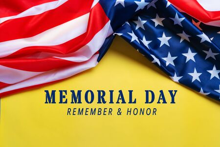 USA Memorial day and Independence day concept, United States of America flag on yellow backgroundの写真素材