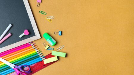 School supplies on black board background. Back to school conceptの写真素材