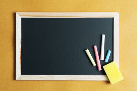 School supplies on black board background. Back to school conceptの写真素材