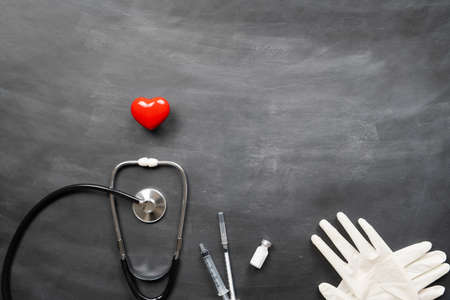 Healthcare medical insurance with red heart, stethoscope and medical suppliesの写真素材