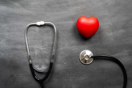 Healthcare medical insurance with red heart and stethoscopeの写真素材