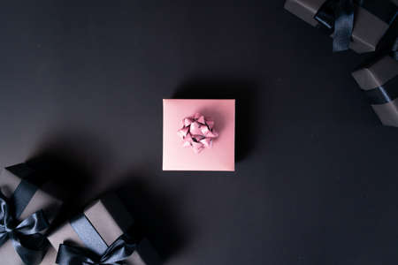 Boxing day Sale concept Christmas gift box on black background, top viewの写真素材