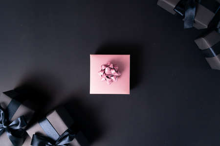 Boxing day Sale concept Christmas gift box on black background, top viewの写真素材