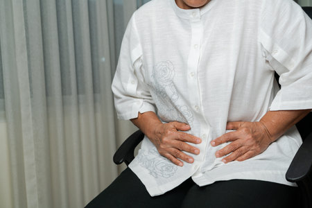 stomach pain of old woman at home, healthcare problem of senior concept