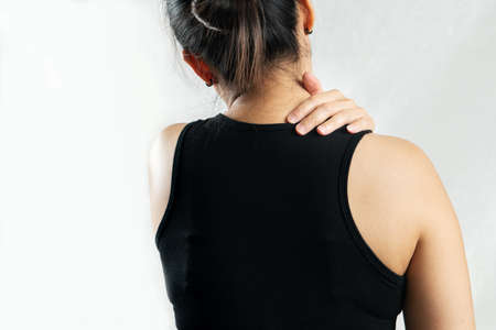 young women neck and shoulder pain injury, healthcare and medical conceptの写真素材