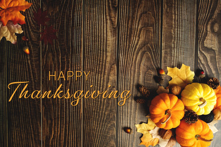 Happy Thanksgiving Day with pumpkin and nut on wooden tableの写真素材