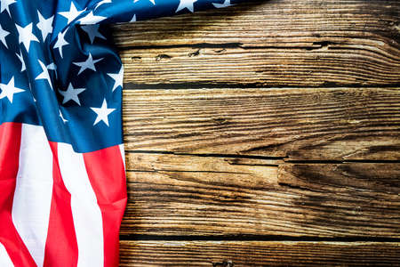 Veterans day. Honoring all who served. American flag on wooden backgroundの写真素材