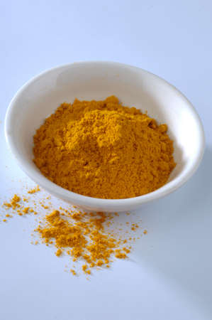 ground sweet pepper in a white bowlの写真素材