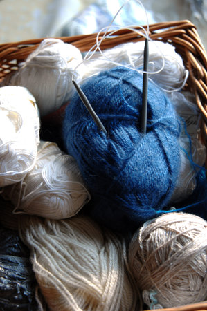 colorful skeins of wool in a basket