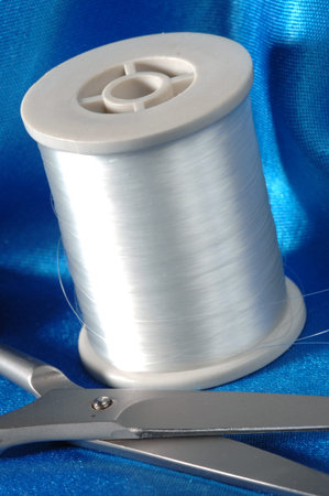 threads, sewing utensils in the composition