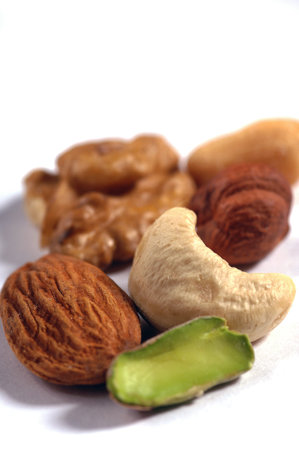 various nuts on a white background