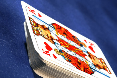 playing cards on a blue backgroundのeditorial素材