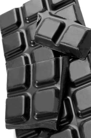 hard dark chocolate bars on a white backgroundの写真素材