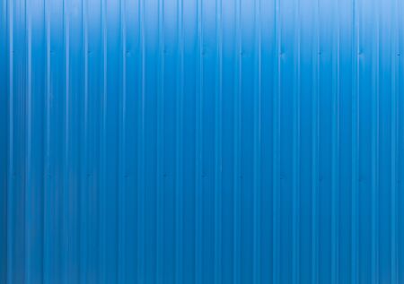 Blank blue metal sheet, seamless vertical, background texture.の写真素材