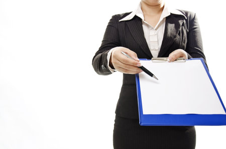  business woman pointing to note pad