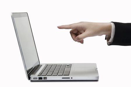 woman hand pointing to computer screenの写真素材