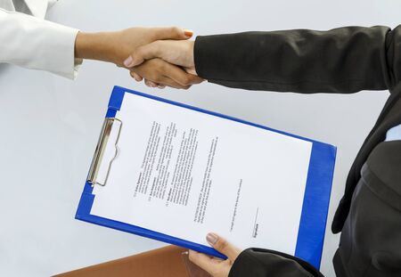 Business person handshaking for contract dealの写真素材