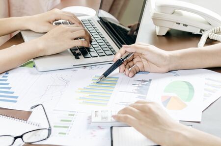 two women discussing business plan