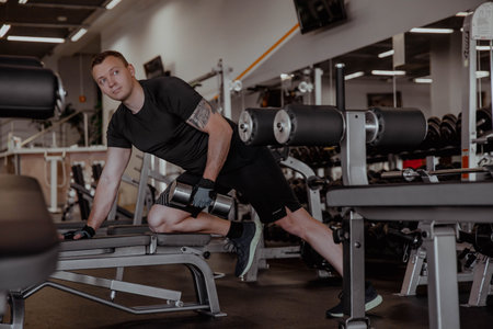 Man in the gym with weight