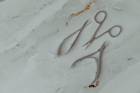 Manicure tools on a light marble backgroundの写真素材