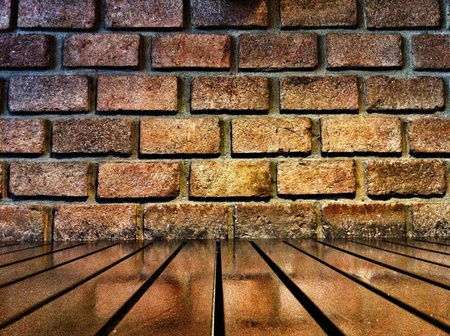 Background of bricks and wood table for grunge styleの素材