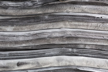 stack of black rubber sheet in manufactory backgroundの写真素材