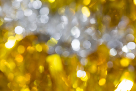 Bokeh abstract background of white and gold christmas fur decorationの写真素材