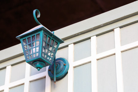 Vintage lantern on wooden wallの写真素材