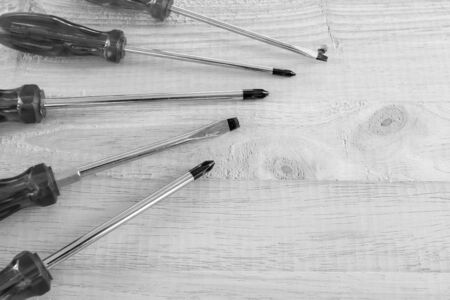 Screwdriver on wooden background, Black and white colorの写真素材