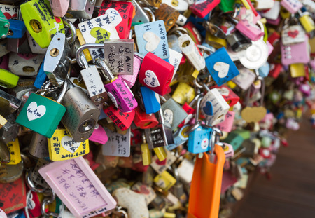 SOUTH KOREA - JUL 12, 2014: Love padlocks at N Seoul Tower in Seoul, South Koreaのeditorial素材