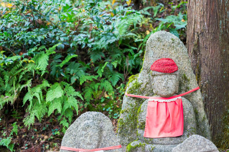 Stone statue or Jizo statue in Kiyomizu-dera temple, Kyoto, Japanの写真素材