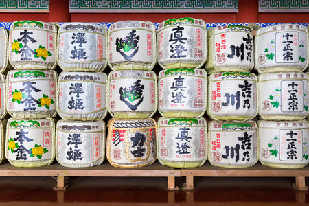 NIKKO, JAPAN - OCTOBER 20, 2016: Collection of Japanese sake barrels stacked in Toshogu Shinto shrine, Nikko, Japanのeditorial素材